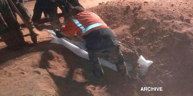 Mass grave for martyrs unearthed in Deir Ezzor