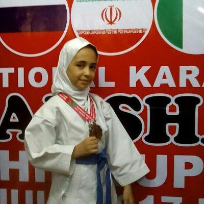 Iranian teenager receives karate gold