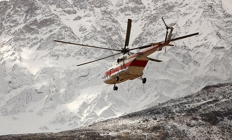 Rescue teams climb to plane crash site in SW Iran