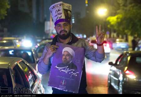 Iranians celebrate Rouhani’s landslide victory