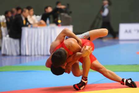 Iranian broken-ear wrestlers win Thailand champs